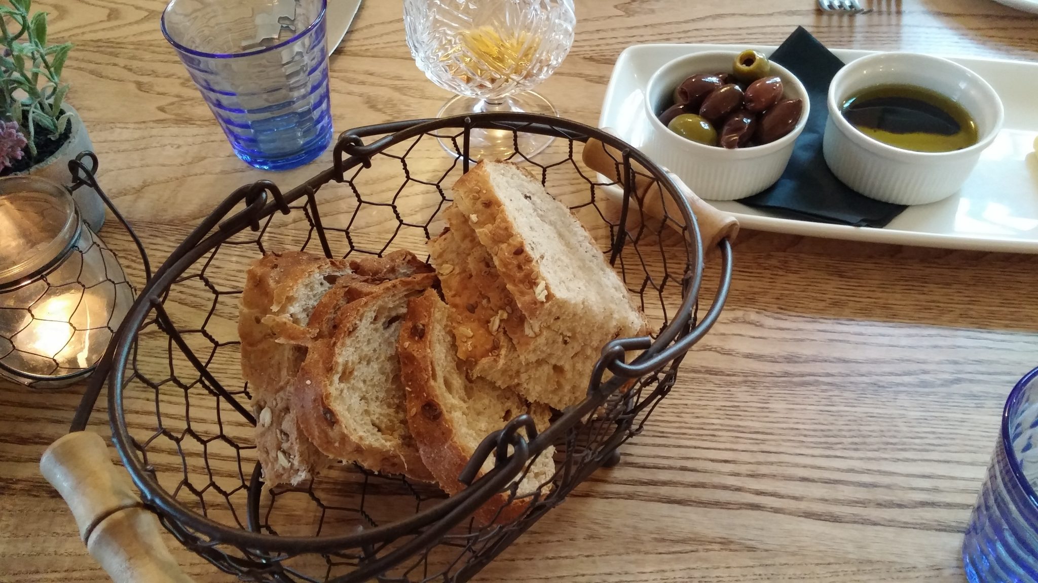 Artisan bread, olives, dipping oils