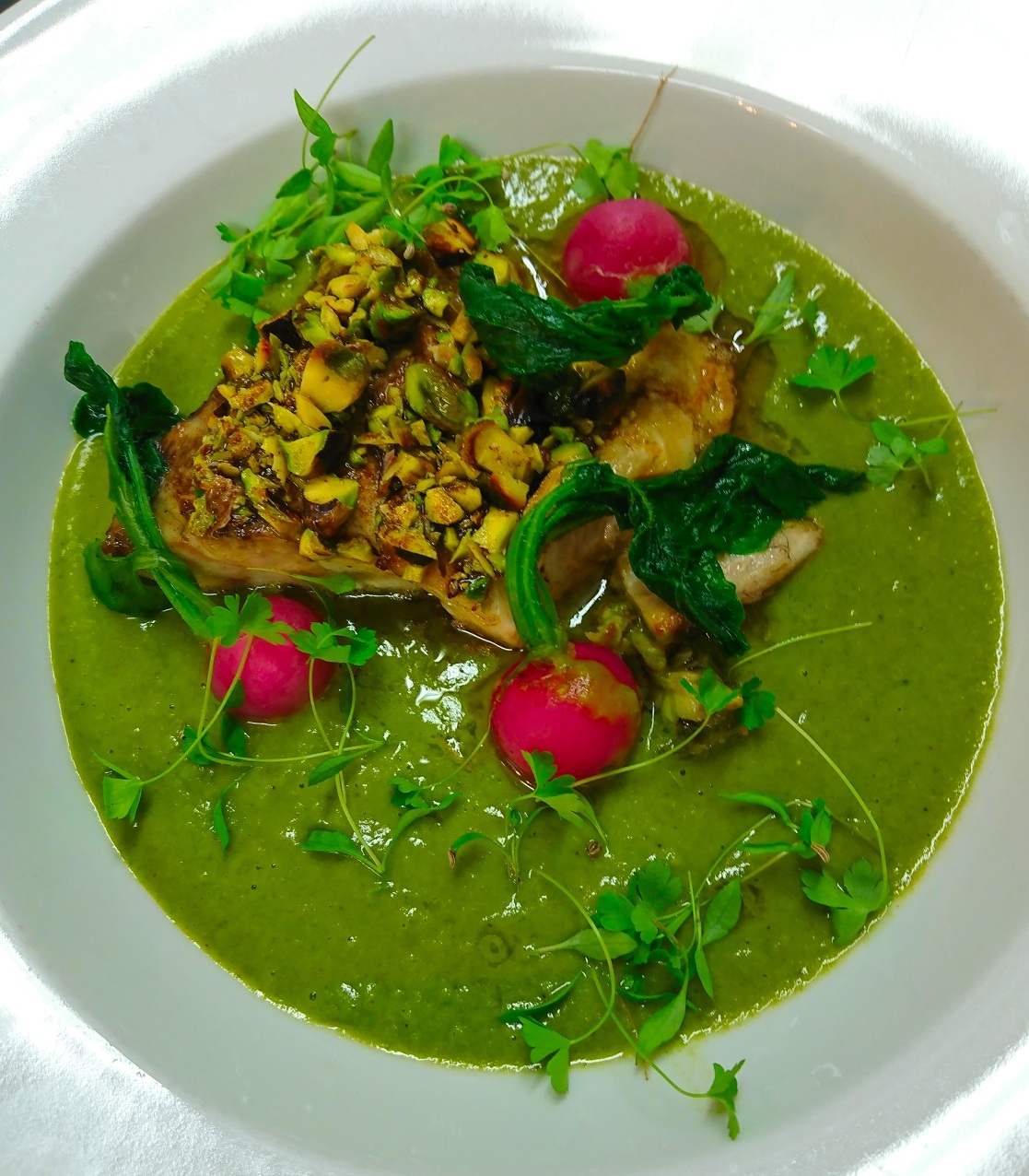 Pan seared hake fillet, parsley & wild rocket vichyssoise, garnished with blanched radish