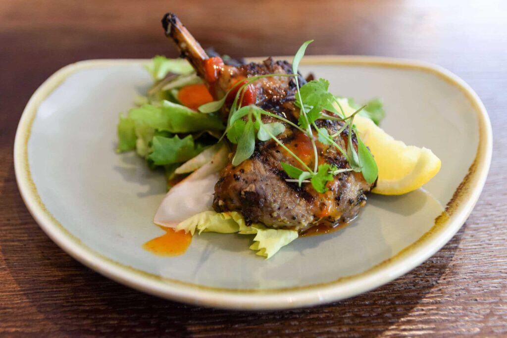Grilled lamb chop, roasted red pepper purée