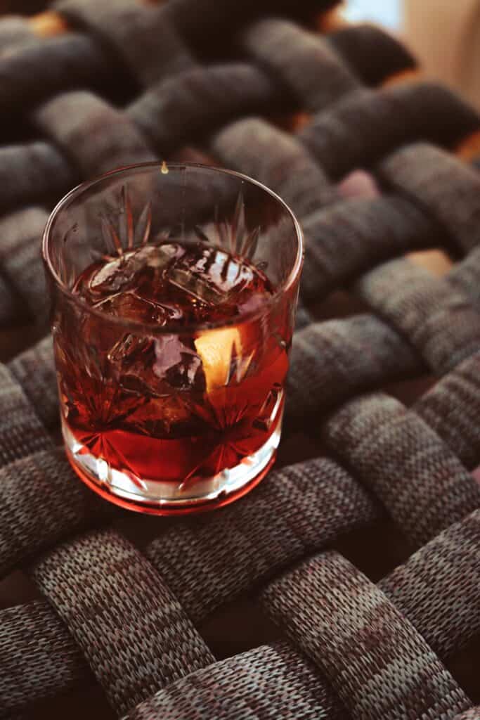 CHRISTMAS TIPPLES FROM MASTER OF MALT 3 A Negroni cocktail is pictured on a woven table top